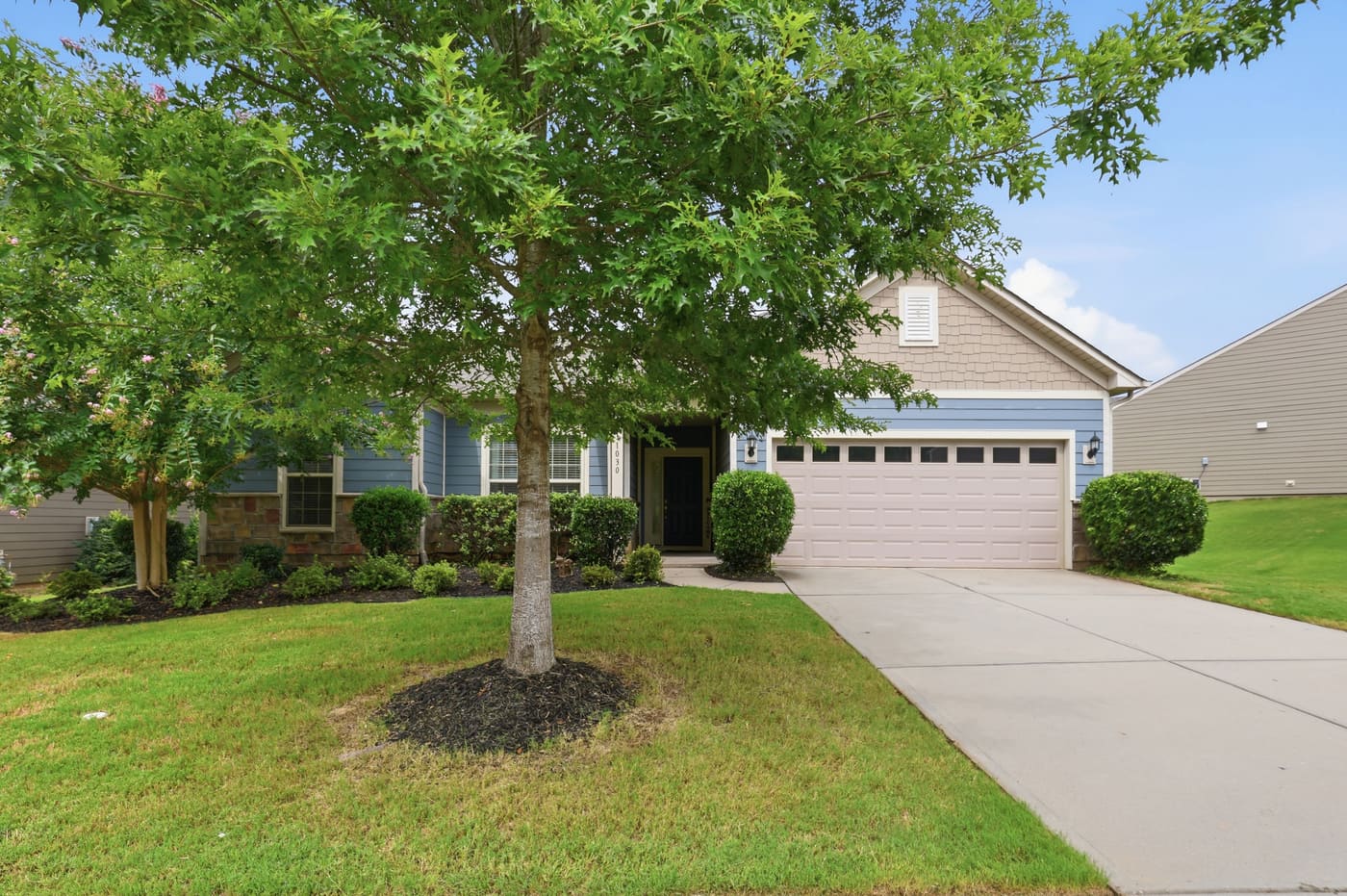 The front of the house from the driveway approach.