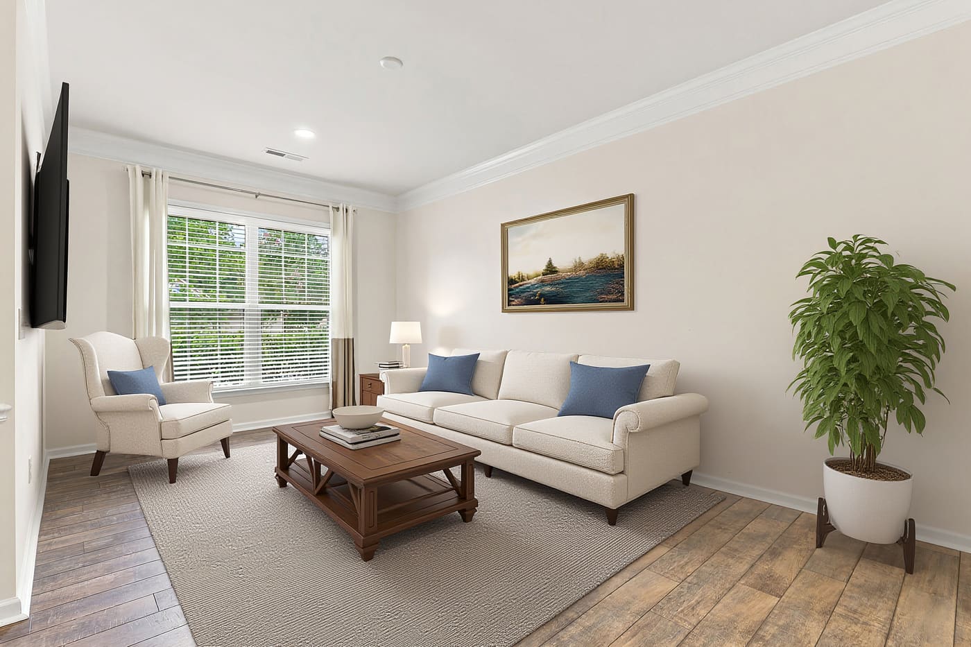 The same flex room shown with a sofa, armchair and coffee table added digitally.